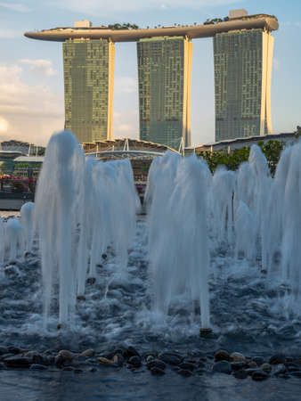 SINGAPORE CITY, SINGAPORE - FEBRUARY 15, 2020: Marina Bay Sands at sunrise the largest hotel in Asia. It opened on 27 April 2010.のeditorial素材