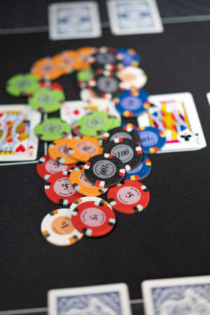 High stakes Texas hold 'em poker game at the casinoの写真素材
