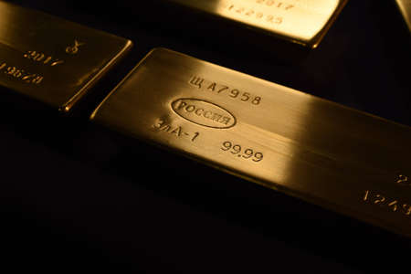 Gold bar from the gold reserve of Russia. Words in the photo: Russia. In the photo there are not translated technical designations.の写真素材