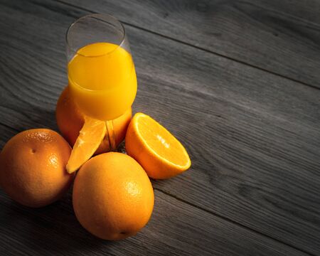 Orange Juice on Vintage Wood Tableの写真素材