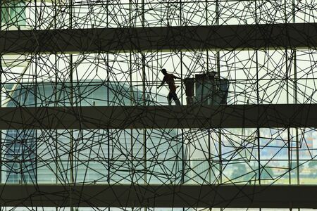Cleaner in the abstract building, Singaporeの写真素材