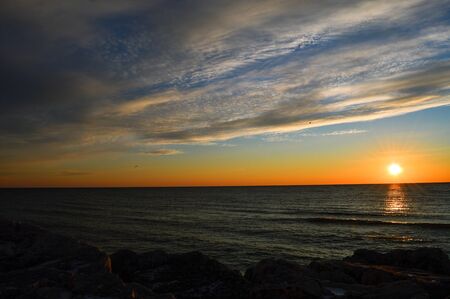 Sunrise pushes the clouds away and create a spectactular dawn