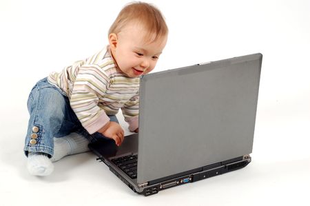 baby having fun with laptop #11の写真素材