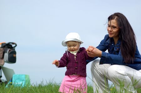 happy family on green grassの写真素材