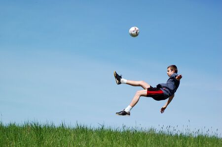 happy football player on sky backgroundの写真素材