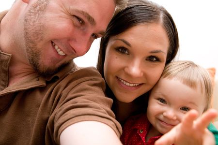 mother, father and baby girl togetherの写真素材