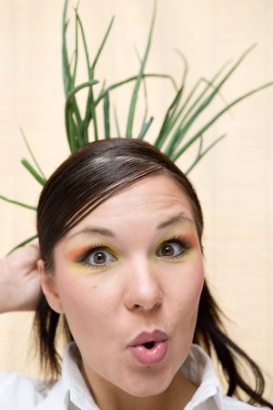 attractive brunette woman with vegetableの写真素材