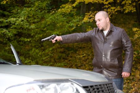 danger gangster traveling by carの写真素材