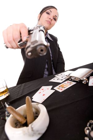 attractive brunette woman with gun on white backgroundのeditorial素材