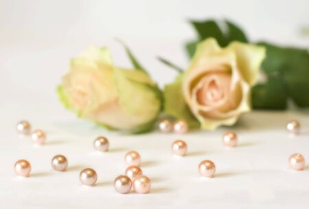 Pink pearls with two rosesの写真素材