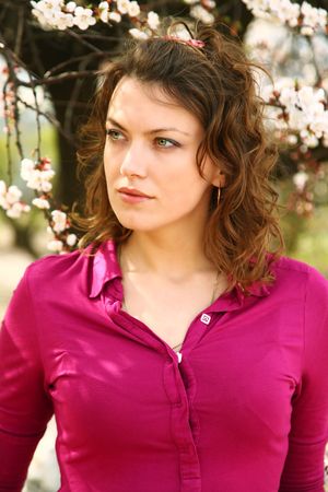 Young woman in spring gardenの写真素材