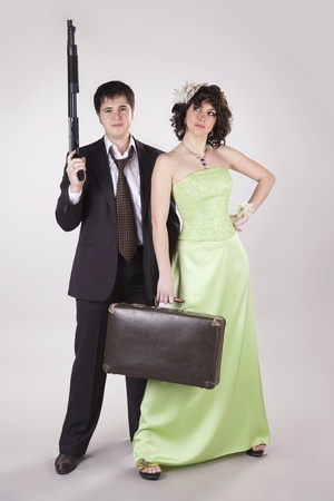 Picture of young couple of old style robbersの写真素材