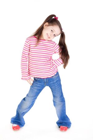 Picture of the funny little girl in blue jeansの写真素材