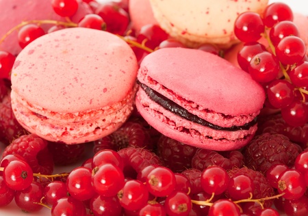 Red fruit flavored macarons with the berriesの写真素材