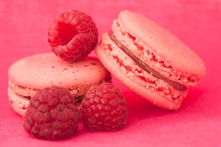 Red fruit flavored macaroons with the berriesの写真素材