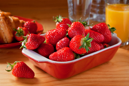 Tasty breakfast with croissants and strawberriesの写真素材