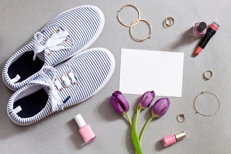 Shopping and fashion concept. Set of  stylish woman accessories on gray background. Top view point, flat layの写真素材