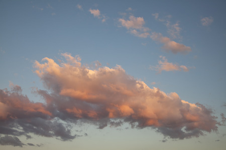 Dramatic clouds at the sunsetの写真素材