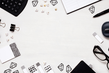 Overhead view to various office supplies. Flat lay with mockup plannerの写真素材
