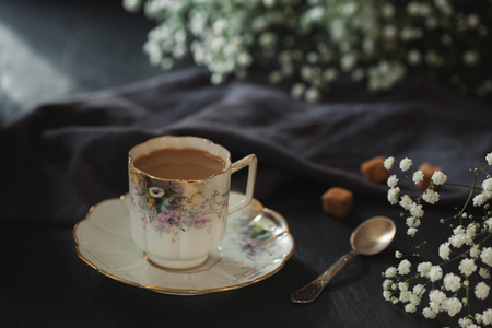 Vintage cup of coffee on the table の写真素材