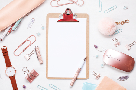Overhead view to various office supplies. Flat lay with mockup plannerの写真素材