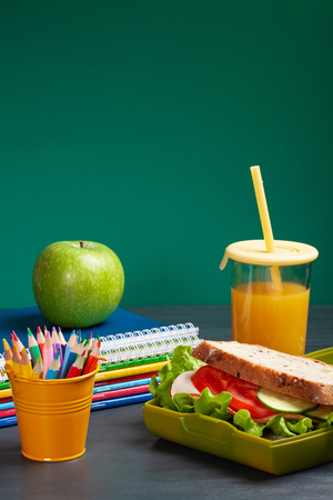 Fresh sandwich and apple for healthy lunch in the plastic lunch boxの写真素材