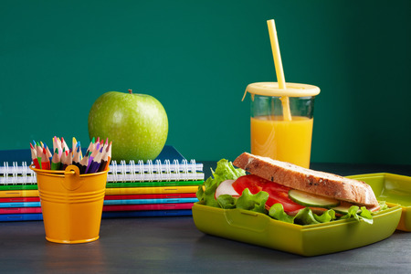 Fresh sandwich and apple for healthy lunch in the plastic lunch boxの写真素材
