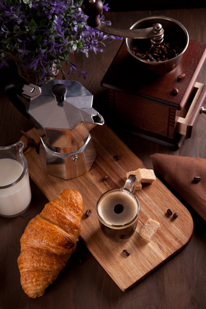 Breakfast with hot expresso and fresh croissantの写真素材