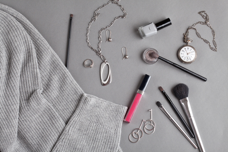 Flat lay with female accessories in gray shadesの写真素材