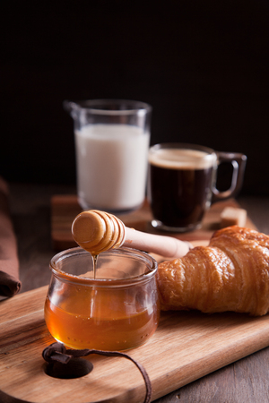 Breakfast with hot expresso and fresh croissantの写真素材