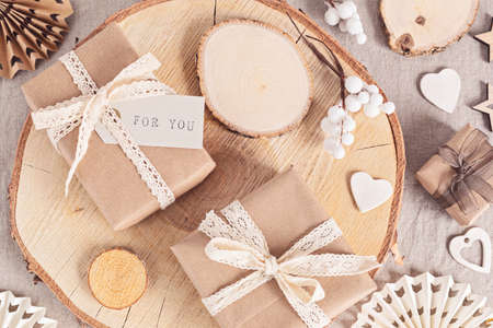 Wrapping gifts and creating eco friendly christmas cards and ornaments in neutral colors. No...