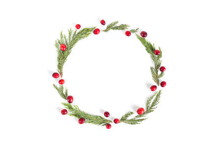 Christmas wreath frame with cranberries on white background, flat lay, top view. Xmas mockup with...