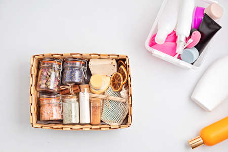 Preparing self care package, seasonal gift box with zero waste cosmetics vs industrial plastic...