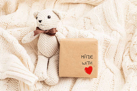 Eco friendly alternative green Xmas gifts wrapped with recycled craft paper and tag made with love. Zero waste Christmas, flat lay, top viewの写真素材