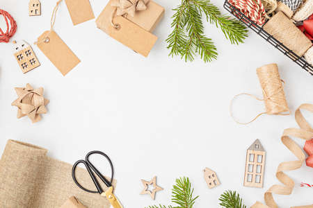 Eco friendly alternative green Xmas gifts wrapped with recycled craft paper. Zero waste Christmas, flat lay, top viewの写真素材