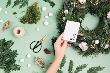 Top view of traditional Christmas wreath made with natural elements. Winter holidays and Christmas celebrationの写真素材