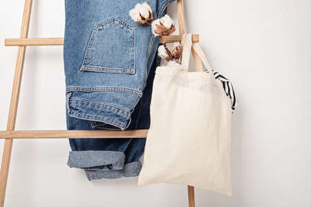 Mockup with organic cotton tote bag and jeans. Sustainable ethical consumption ideaの写真素材