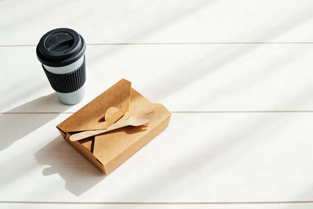 Hot coffee on the go and lunch box. Biodegradable, disposable takeaway food box