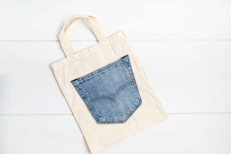 Old jeans upcycling idea. Crafting with denim, recycling old clothers, hobby, diy activityの写真素材