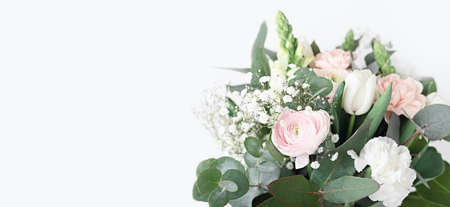 Spring flower bouquet over light background with copy space. Bridal bouquet, online blog headerの写真素材