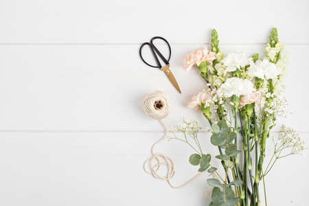 Floral decoration master class, creative workshop, bridal bouquet. Bouquet making in florist shopの写真素材