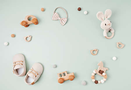 Baby shoes and teethers. Organic newborn accessories, branding, small business idea