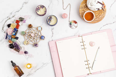 Healing chakra crystal grid therapy. Rituals with gemstones and aromatherapy for wellness, healing, meditationの写真素材