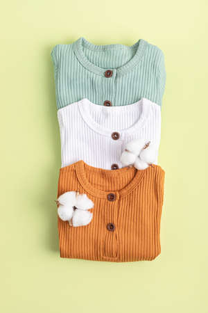 Gender neutral baby garment. Organic cotton clothes, newborn fashionの写真素材