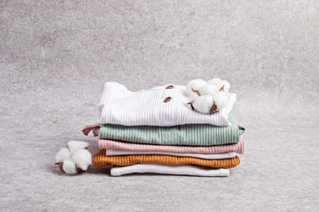 Gender neutral baby garment. Organic cotton clothes, newborn fashionの写真素材