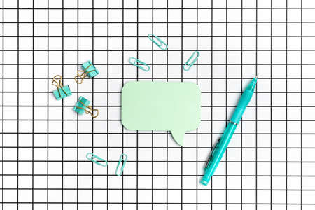 School stationery on checkered white background. Back to school idea