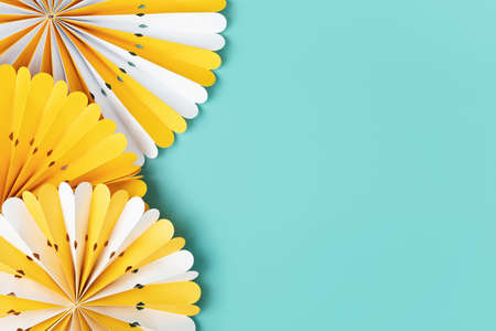 Festive party background with yellow paper circle fans over blue pastel background