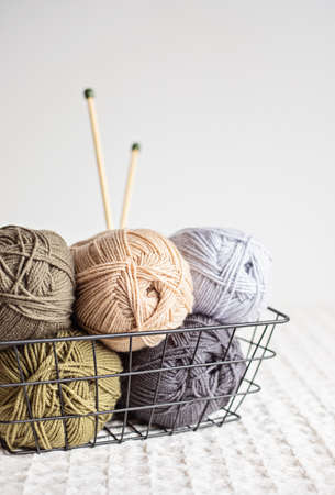 Craft hobby background with yarn in natural colors. Recomforting, destressing hobby