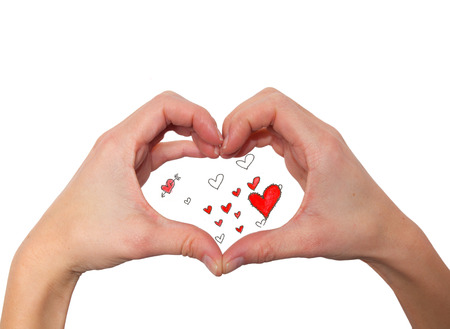 Heart shape made with hands. Drawing of hearts inside handsの写真素材
