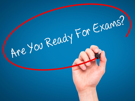 Man Hand writing Are You Ready For Exams? with black marker on visual screen. Isolated on blue. Business, technology, internet concept. Stock Photoの写真素材